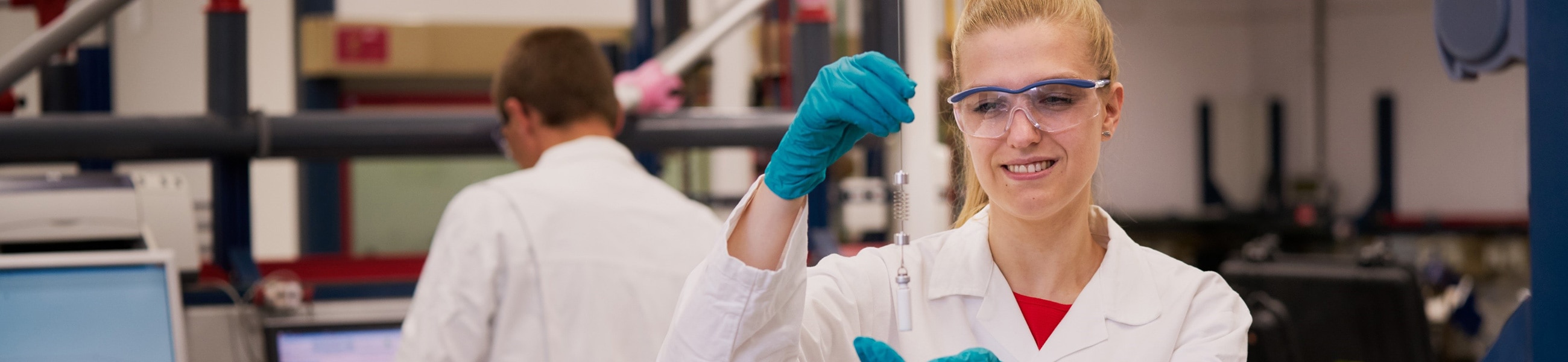 scientist working with equipment in the lab