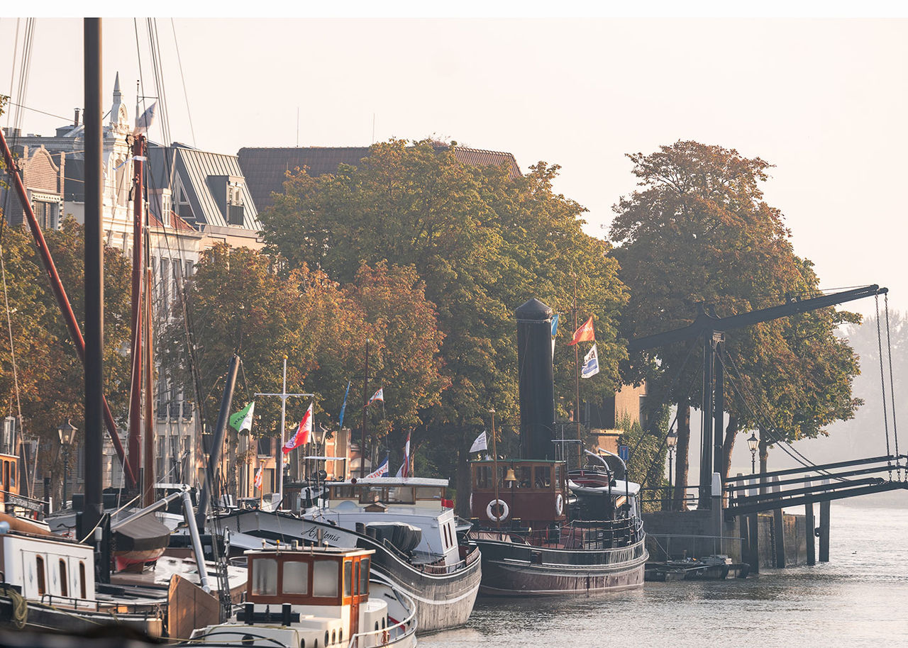 boats docked in a canal in the Netherlands